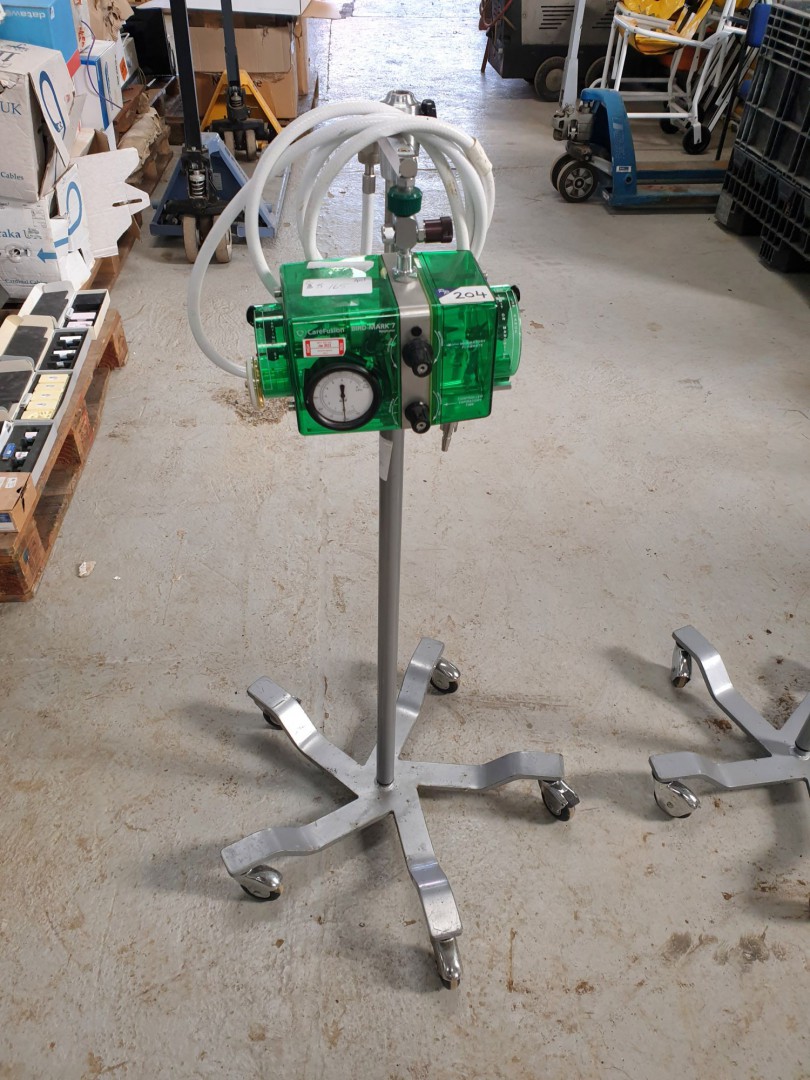 Care Fusion Bird Mark 7 respirator on mobile stand...