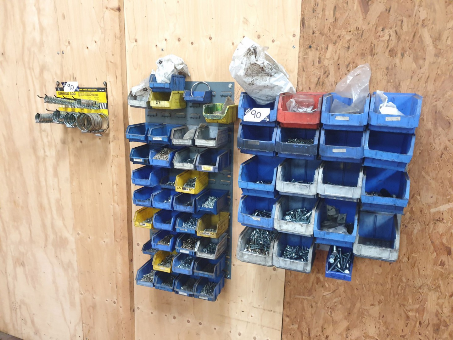 Plastic lin bin rack with various contents inc: sc...