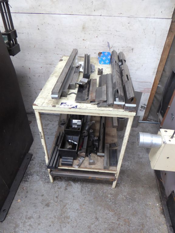 Qty various press brake tooling on workbench